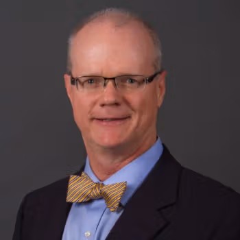 Mark L. Warren